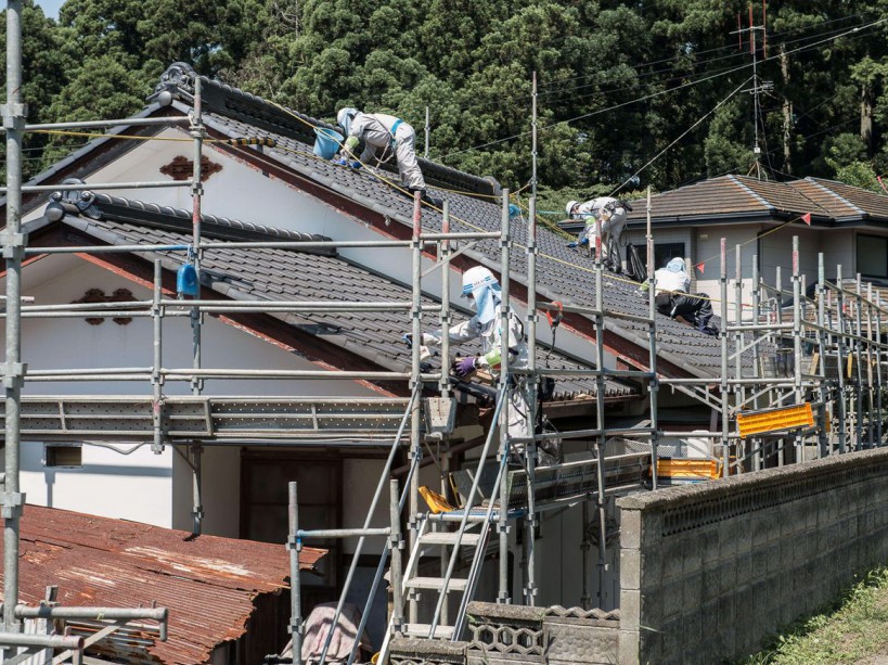 EXCLUSIVE. SPECIAL FEES APPLY . MANDATORY CREDIT: Arkadiusz Podniesinski/REX Shutterstock Mandatory Credit: Photo by Arkadiusz Podniesinski/REX Shutterstock (5224634cx) Workers scrub a house to allow residents to move back to their homes Fukushima, Japan - Sep 2015 FULL COPY: http://www.rexfeatures.com/nanolink/r7ku MINIMUM USE FEE A photographer has taken stunning and revealing pictures of the exclusion zone from the 2011 Fukushima Nuclear Disaster. Within a 20km radius the radioactive exclusion zone demonstrates the dangerous nature of nuclear energy. A network of abandoned towns and villages that once housed hundreds of thousands of people, the exclusion zone of the largest nuclear accident since Chernobyl is eerie and frightening. /EXCL_Rex_Fukushima_16/EXCLUSIVE. SPECIAL FEES APPLY . MANDATORY CREDIT: Arkadiusz Podniesinski/REX Shutterstock/1510071746